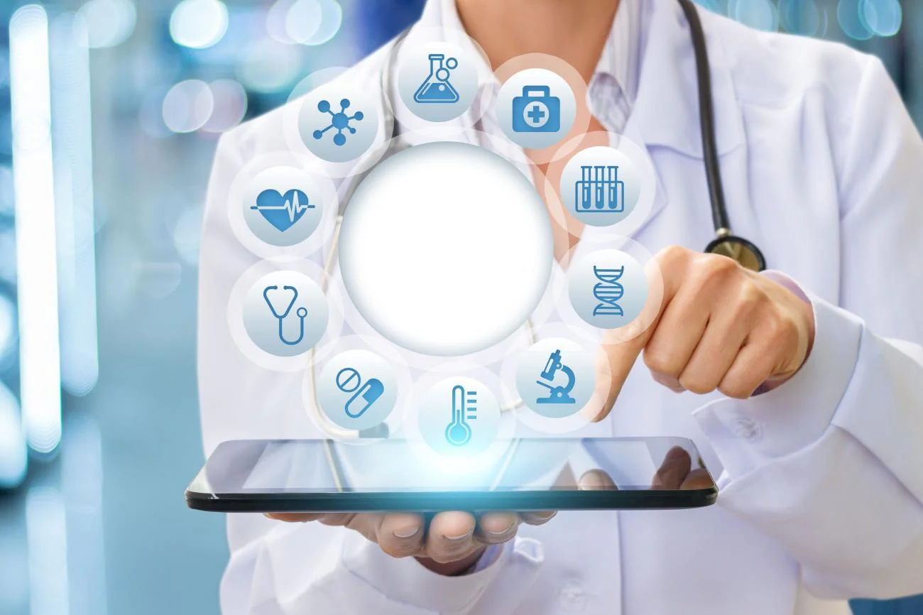 A clinician with a tablet surrounded by medical diagnostic icons